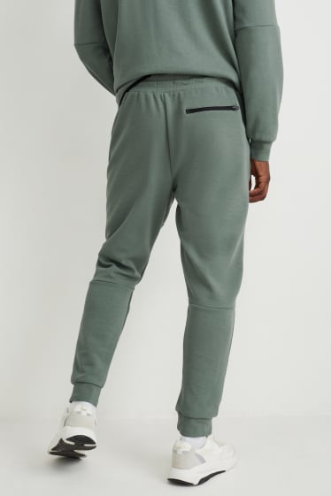 Uomo - Pantaloni sportiv - verde