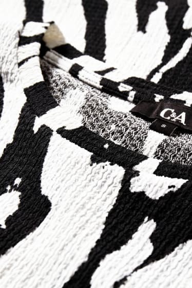 Dona - Samarreta de màniga curta - estampada - negre/blanc