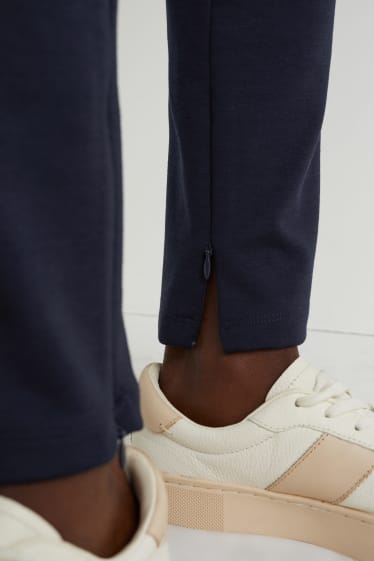 Dona - Pantalons de punt de samarreta - straight fit - blau fosc