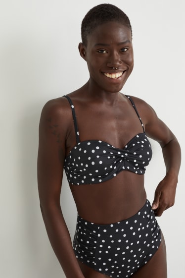 Donna - Top bikini con ferretti - fascia - imbottito - pois - nero