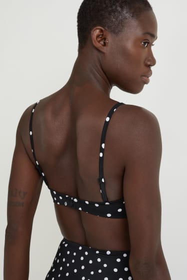 Femmes - Haut de bikini à armature - style bandeau - ampliforme - à pois - noir