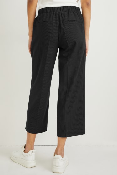 Kobiety - Spodnie materiałowe - średni stan - szerokie nogawki - w paski - ciemnoniebieski