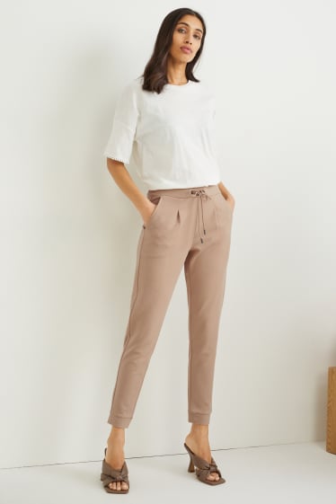 Women - Jersey trousers - tapered fit - beige
