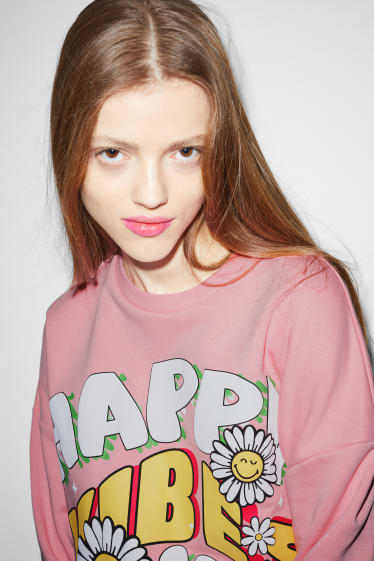 Adolescenți și tineri - CLOCKHOUSE - bluză de molton - SmileyWorld® - roz