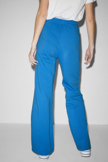 Kobiety - CLOCKHOUSE - spodnie dresowe - niebieski