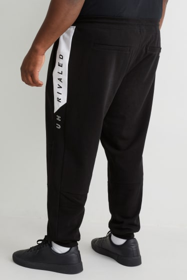 Uomo - Pantaloni sportivi - nero