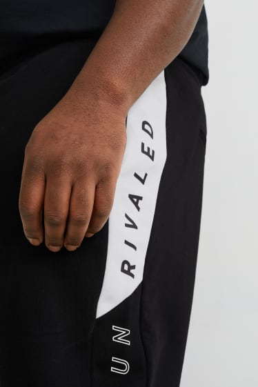 Hommes - Pantalon de jogging - noir