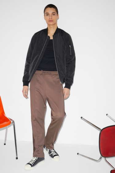 Hommes - Pantalon de jogging - marron