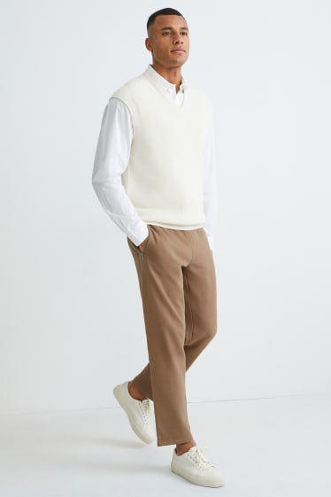 Mężczyźni - Spodnie dresowe - jasnobrązowy