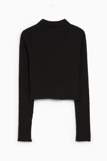 Jóvenes - CLOCKHOUSE - blusa crop - negro