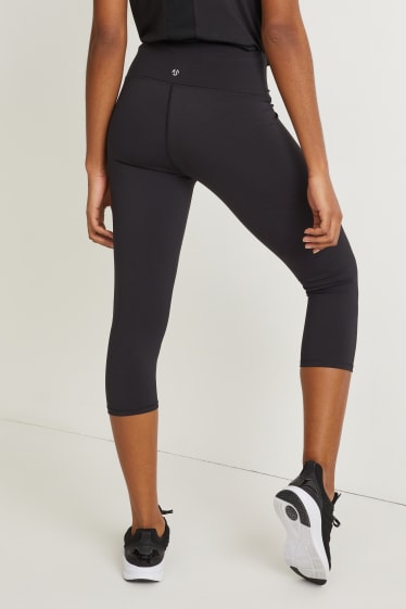 Damen - Funktions-Capri-Leggings - Supportive - Yoga - schwarz