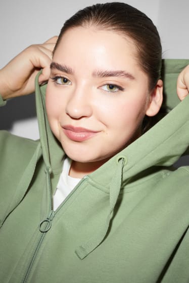 Dospívající a mladí - CLOCKHOUSE - tepláková bunda s kapucí - světle zelená