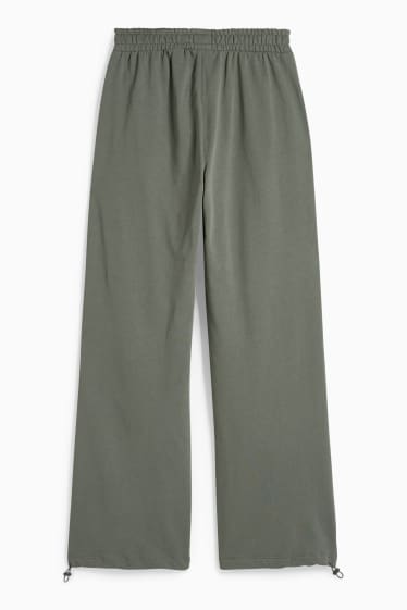 Nastolatki - CLOCKHOUSE - spodnie dresowe - zielony