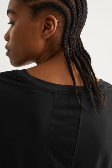Dona - Samarreta tècnica crop - fitnes - 4 Way Stretch - negre