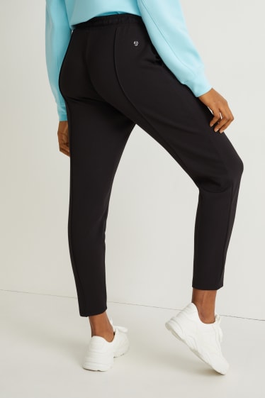Kobiety - Funkcyjne spodnie dresowe - trening - 4 Way Stretch - czarny