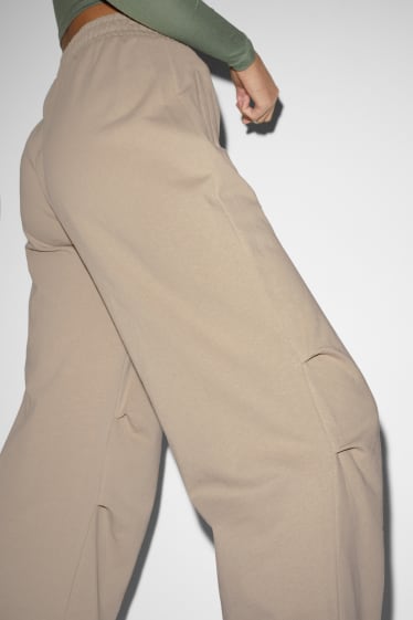 Jóvenes - CLOCKHOUSE - pantalón de deporte - beige claro