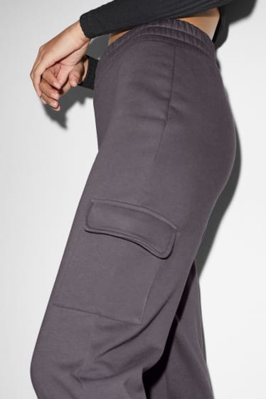 Kobiety - CLOCKHOUSE - spodnie dresowe w stylu bojówek - ciemnoszary
