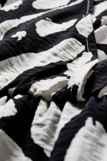 Dames - Jumpsuit - met patroon - zwart / wit