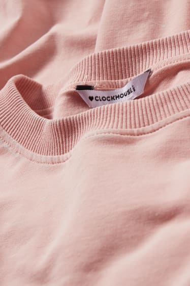 Adolescenți și tineri - CLOCKHOUSE - bluză crop de molton - roz