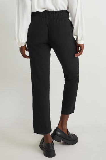 Dona - Pantalons de tela - high waist - regular fit - negre