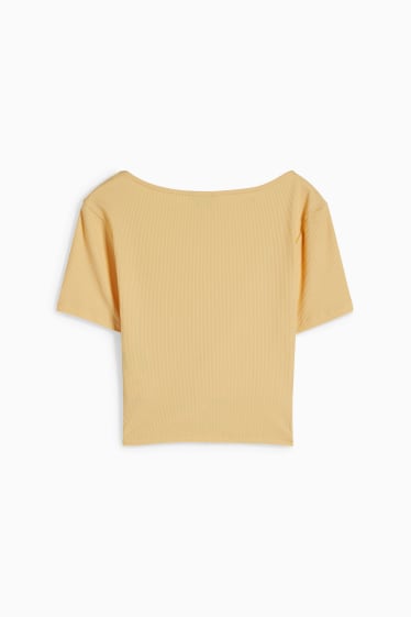 Nastolatki - CLOCKHOUSE - krótki T-shirt - żółty