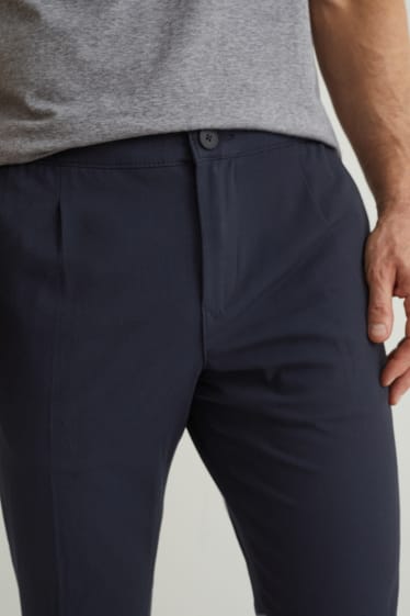 Home - Pantalons xinos - tapered fit - Flex - blau fosc