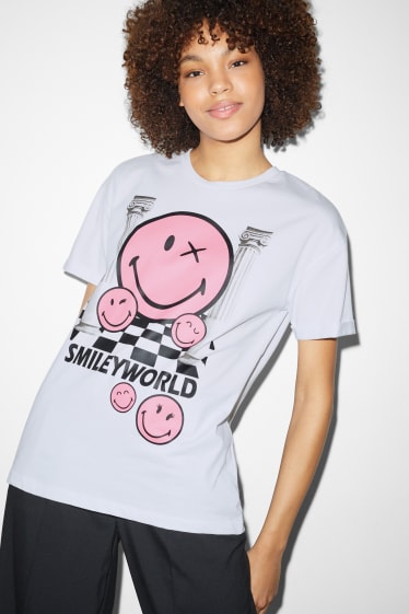 Dames - CLOCKHOUSE - T-shirt - SmileyWorld® - wit