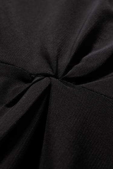Dámské - Přiléhavé šaty s detailem uzlu - černá