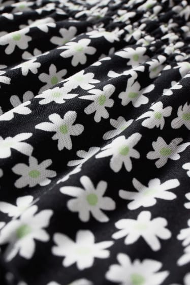 Joves - CLOCKHOUSE - minifaldilla - de flors - negre/blanc