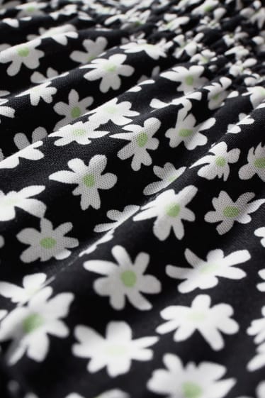 Femmes - CLOCKHOUSE - mini-jupe - à fleurs - noir / blanc