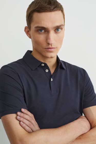 Uomo - Polo - Flex - blu scuro