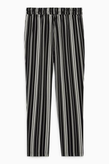 Dona - Pantalons de tela - high waist - tapered fit - negre/blanc