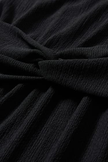 Dames - Fit & flare-jurk met knoop in de stof - zwart
