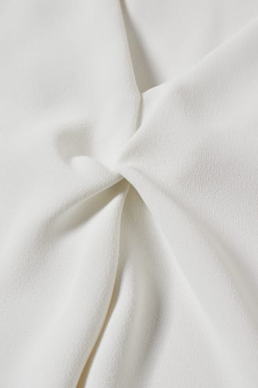 Donna - Blusa smanicata - bianco crema