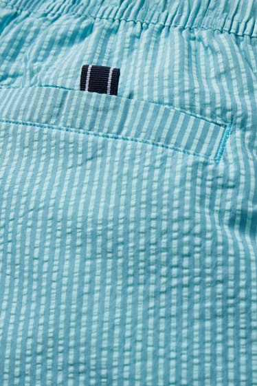 Men - Swim shorts - striped - turquoise