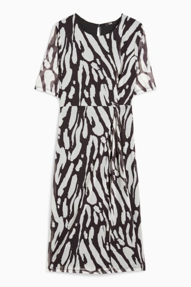 Dames - Nauwsluitende jurk met knoop in de stof - met patroon - zwart / grijs