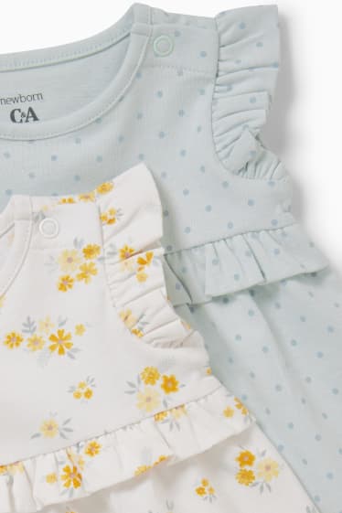 Baby: meisjes - Set van 2 - babyjurk - crème wit