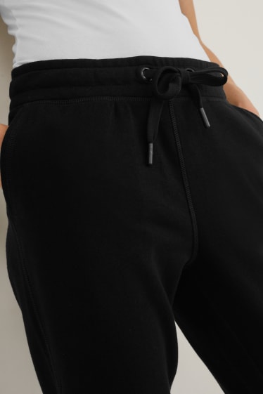 Dámské - Teplákové kalhoty - černá