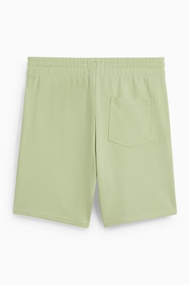 Pánské - Teplákové šortky - světle zelená