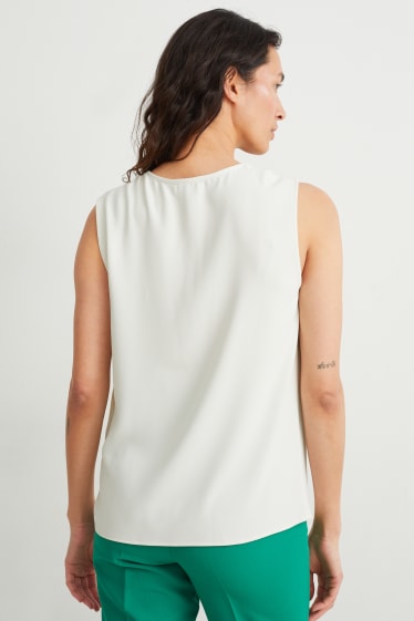 Donna - Blusa smanicata - bianco crema