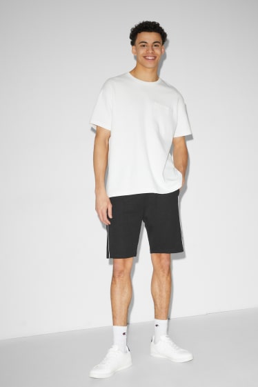 Uomo - Shorts - nero