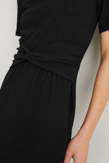 Dames - Fit & flare-jurk met knoop in de stof - zwart