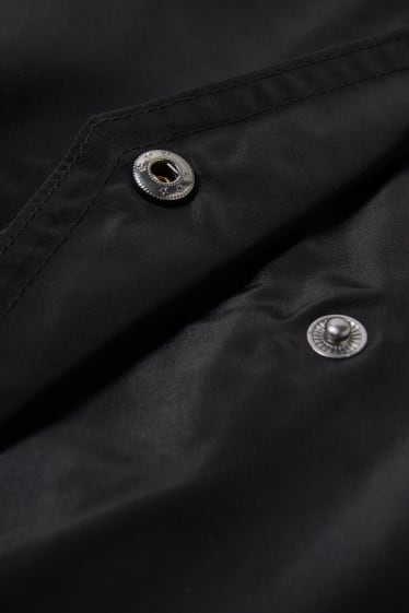 Damen - Jacke mit Kapuze und Tasche - faltbar - schwarz