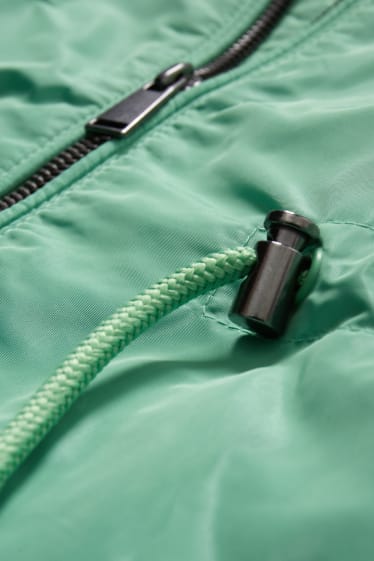 Damen - Jacke mit Kapuze und Tasche - faltbar - grün