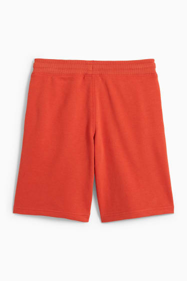 Dětské - Teplákové šortky - tmavě oranžová