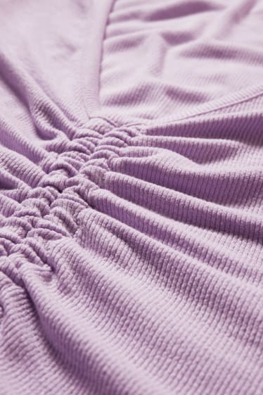 Dona - CLOCKHOUSE - samarreta crop - violeta clar