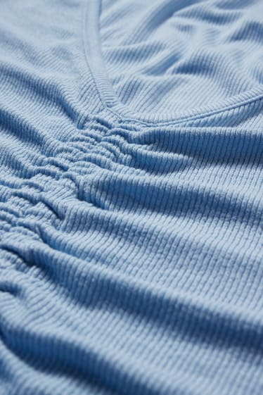 Dona - CLOCKHOUSE - samarreta crop - blau clar