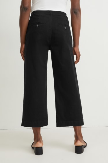 Dona - Pantalons de tela - high waist - wide leg - negre