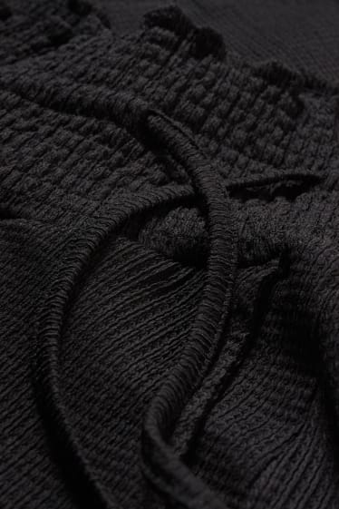 Dámské - Žerzejové těhotenské kalhoty - černá