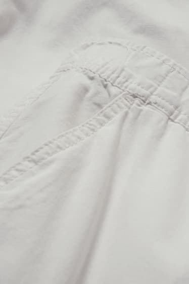 Kobiety - CLOCKHOUSE - spodnie bojówki - średni stan - relaxed fit - biały
